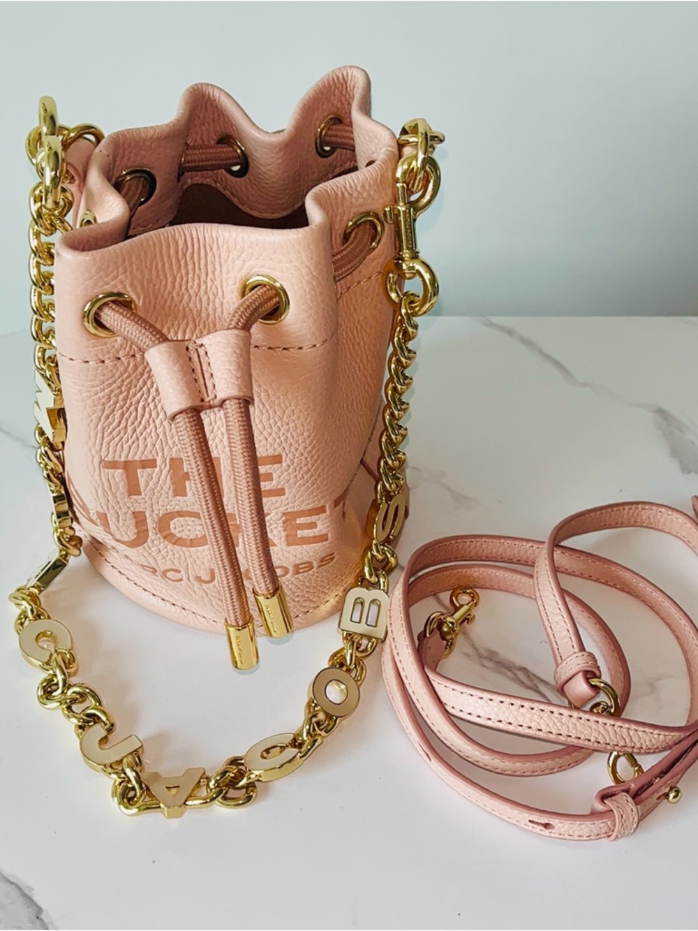 The Marc Jacobs Bucket Blush Pink Leather Drawstring Crossbody Bag